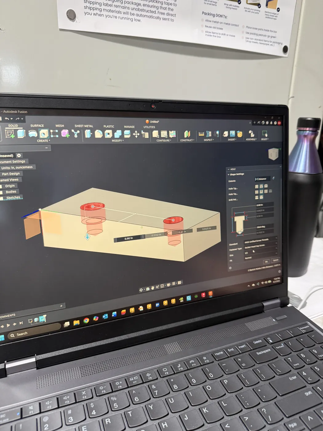 Designing hole features for a part in Autodesk Fusion