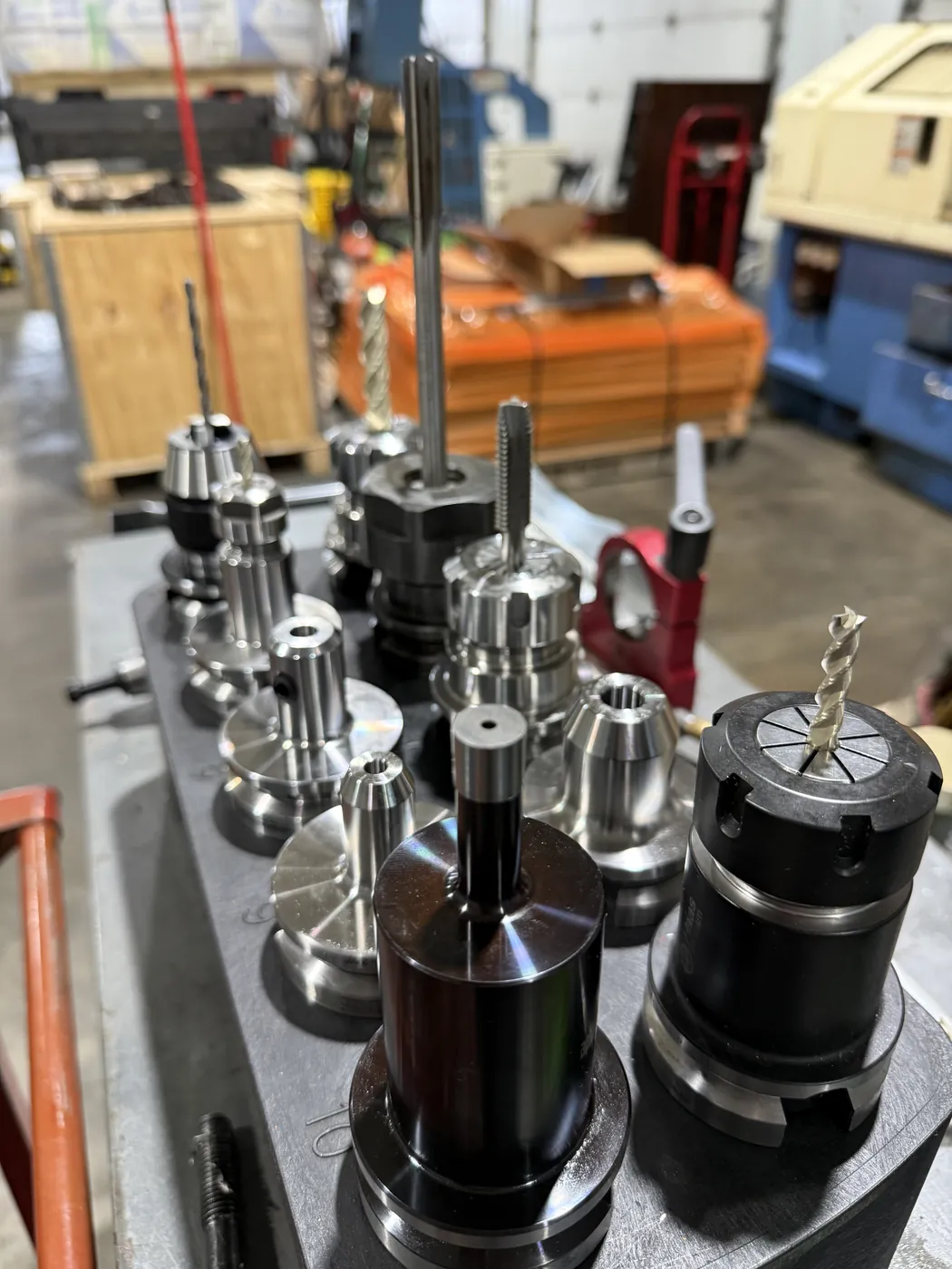 Tool holders set up with drills, reamers, taps, and end mills